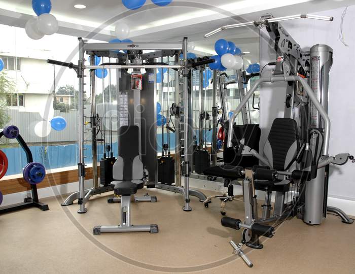 Shoulder and back exercise machines in a modern gym