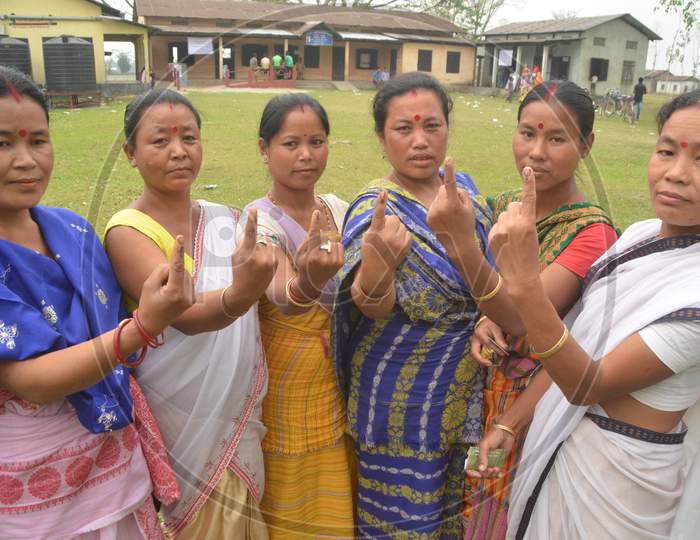 Assamese Woman  Showing  Inked Finger After Casting Vote  in Assembly Elections 2016