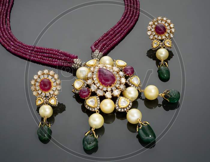 Magenta and Green Gemstone necklace with earrings