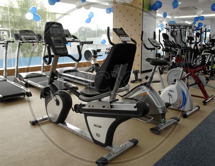 Stationary exercise bikes in a gym
