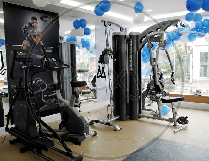 Treadmill and Weight lifting equipment in a gym