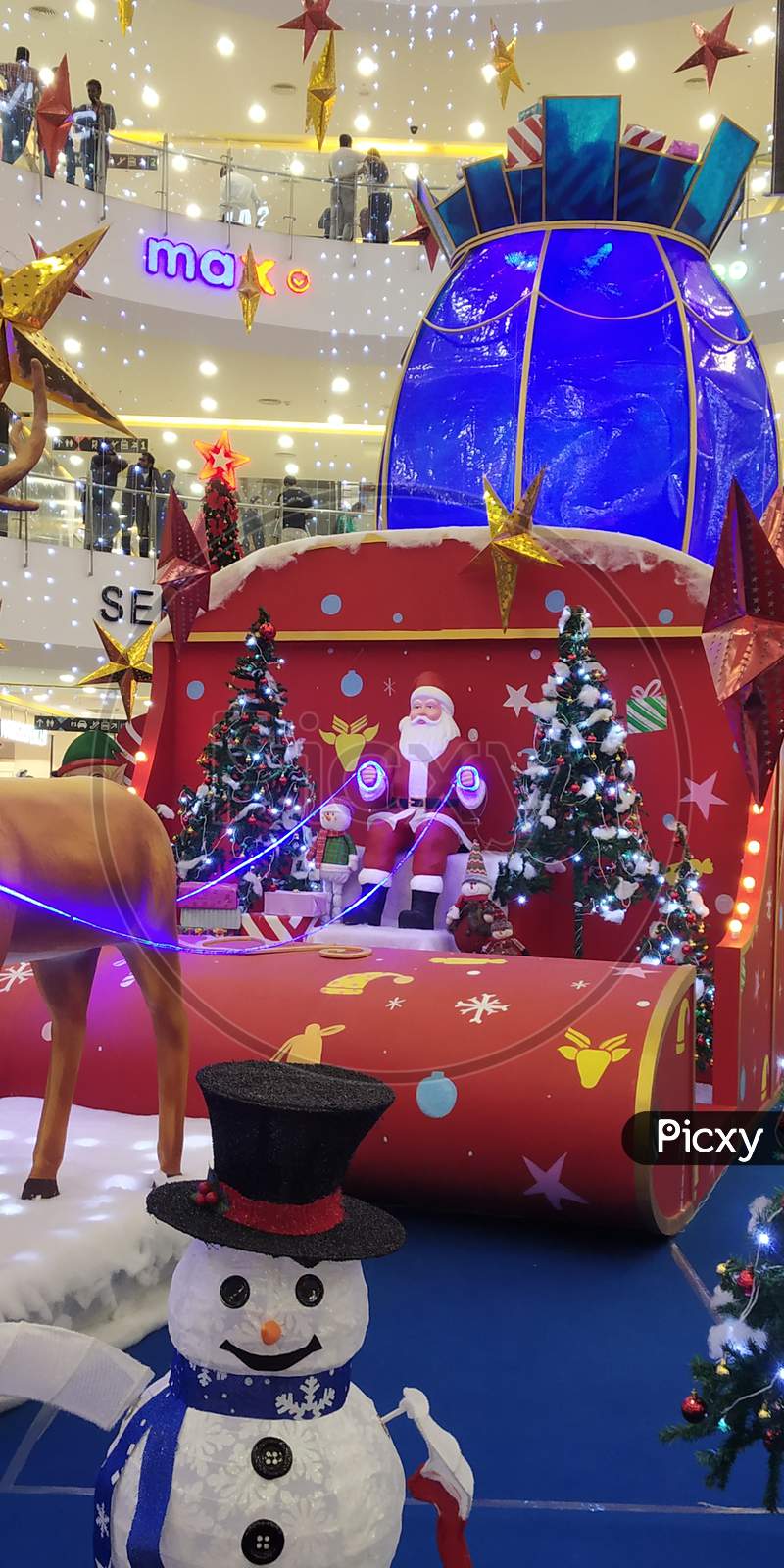 Christmas Santa In an Chariot Model in a Mall On Christmas Eve