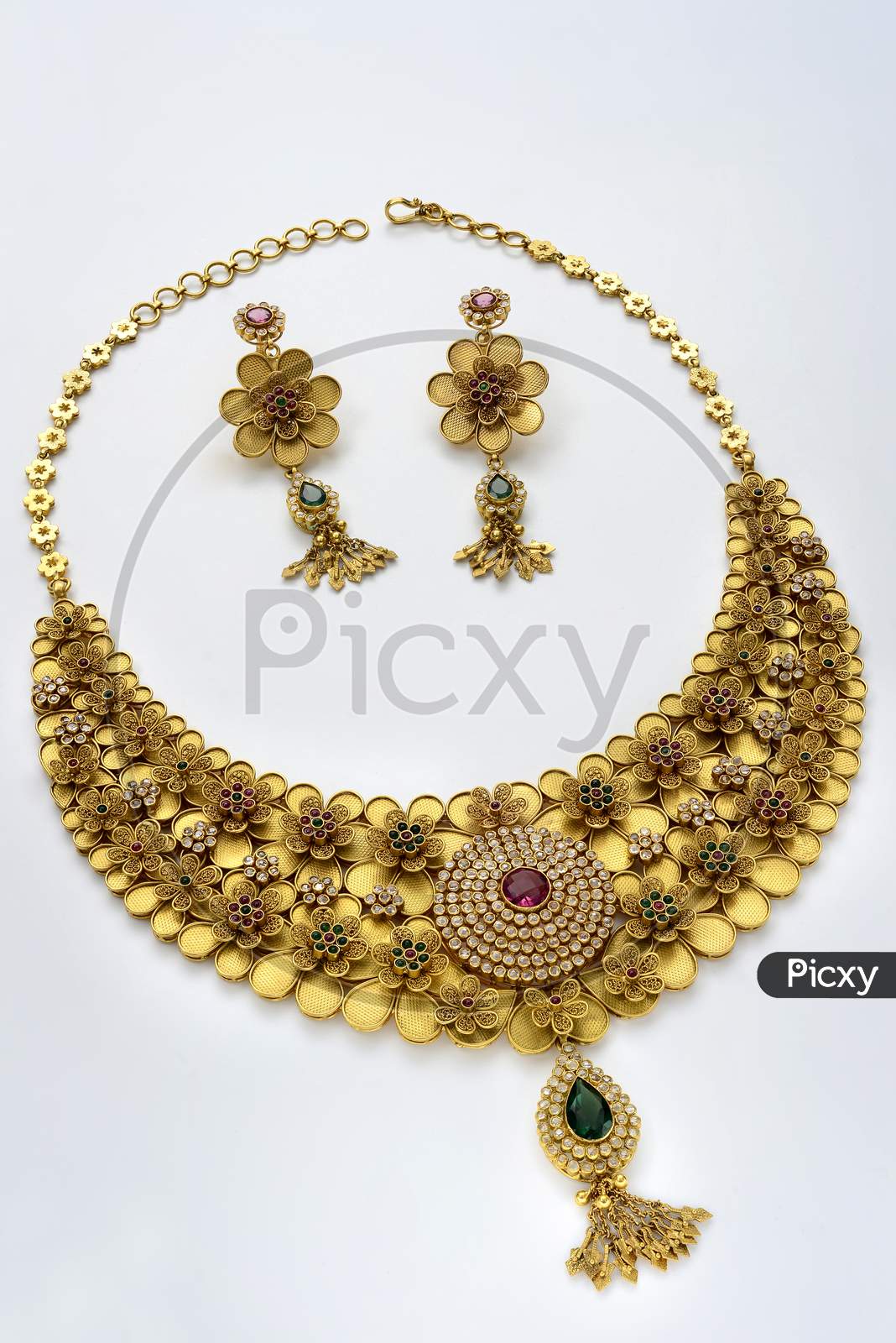A Gold Necklace set with earring set