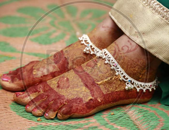 Indian Bride legs with mehendi