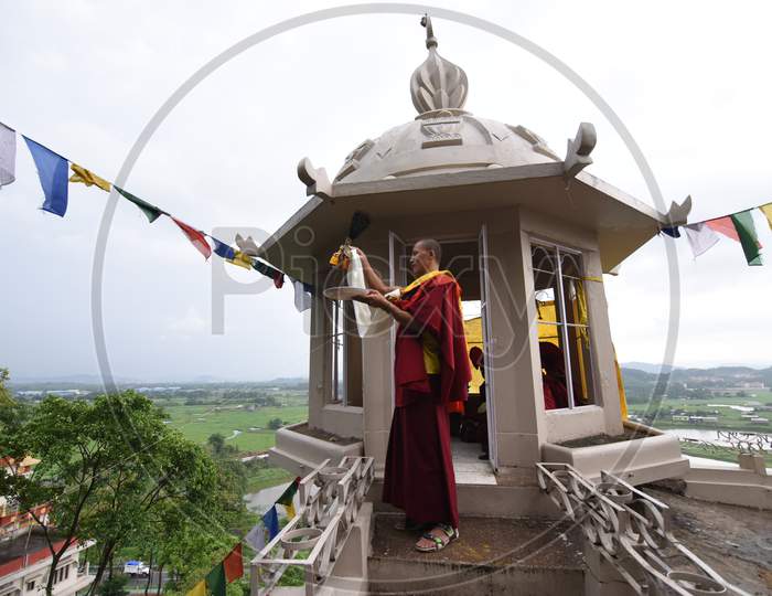 Buddhist Monk Offering Prayer At Shanthi Stupa On Buddha Jayanthi  in Guwahati, Assam