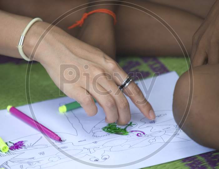 Indian Tribal Students learning drawing