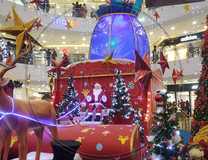 Christmas Santa In an Chariot Model in a Mall On Christmas Eve