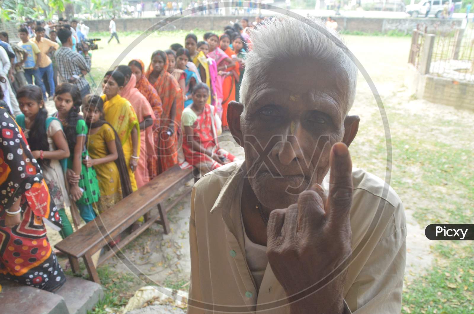 Indian Voter  Showing  Inked Finger After Casting Vote  in Assembly Elections 2016