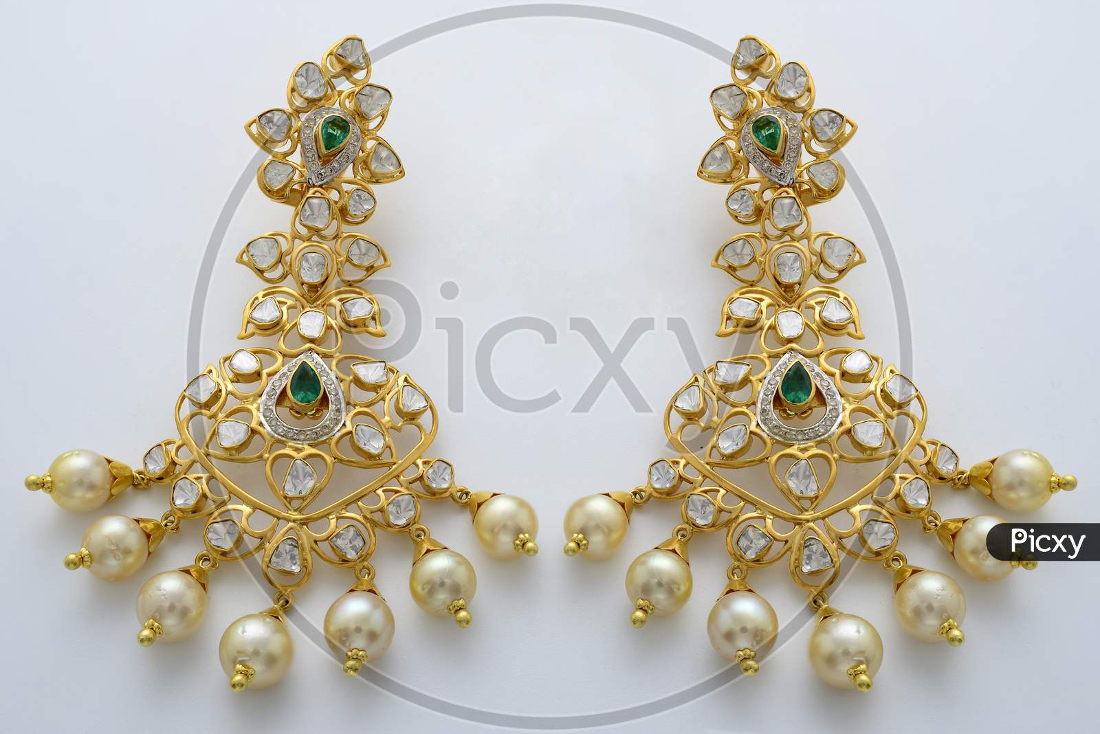 Gold coated earrings with gemstones