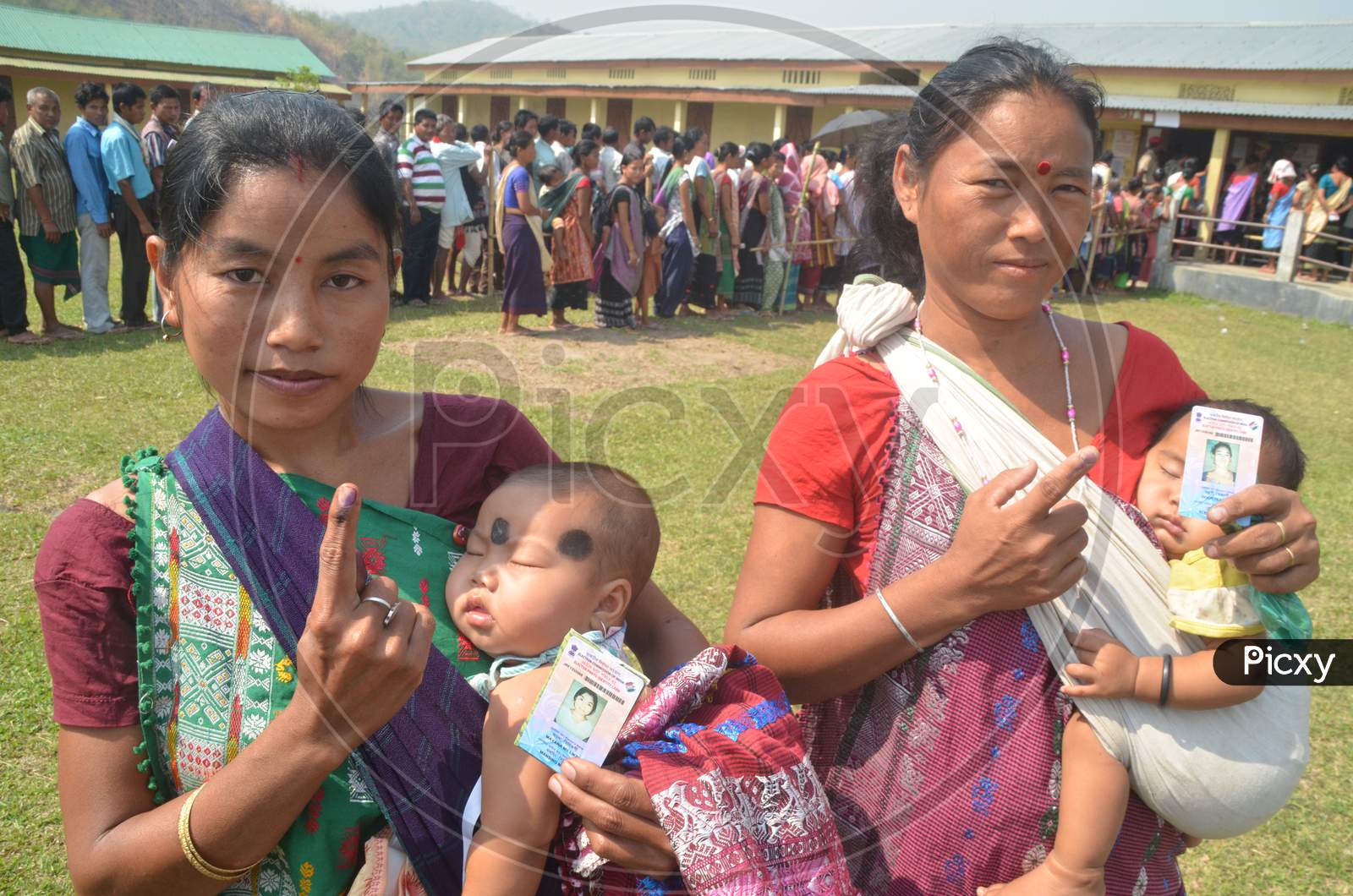 Assamese Woman  Showing  Inked Finger After Casting Vote  in Assembly General Elections 2016