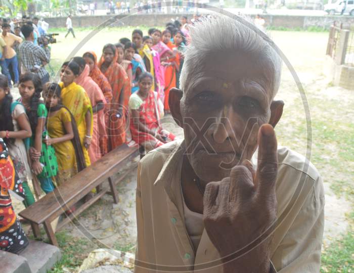 Indian Voter  Showing  Inked Finger After Casting Vote  in Assembly Elections 2016