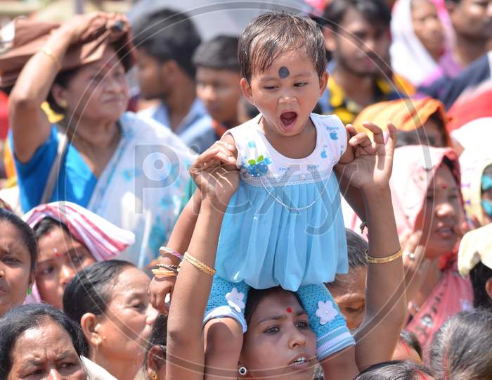 Bharatiya Janata Party (Bjp) Supporters Listen To The Speech Of Prime  Minister Narendra Modi (Unseen) During An Election Rally   In Support Of Bjp Candidate At Raha In Nagaon District Of Assam