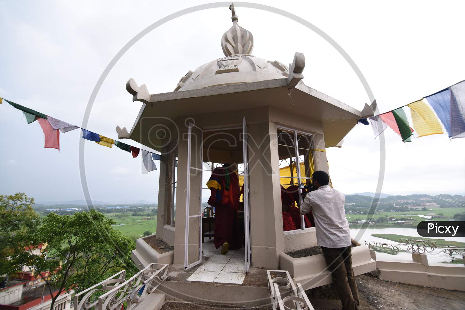 Buddhist Monk Offering Prayer At Shanthi Stupa On Buddha Jayanthi  in Guwahati, Assam