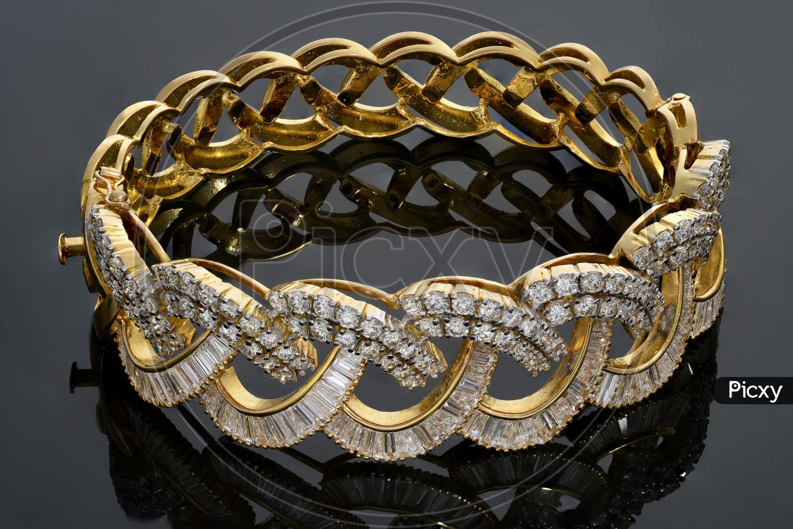 Indian Woman's gold gemstone bangle