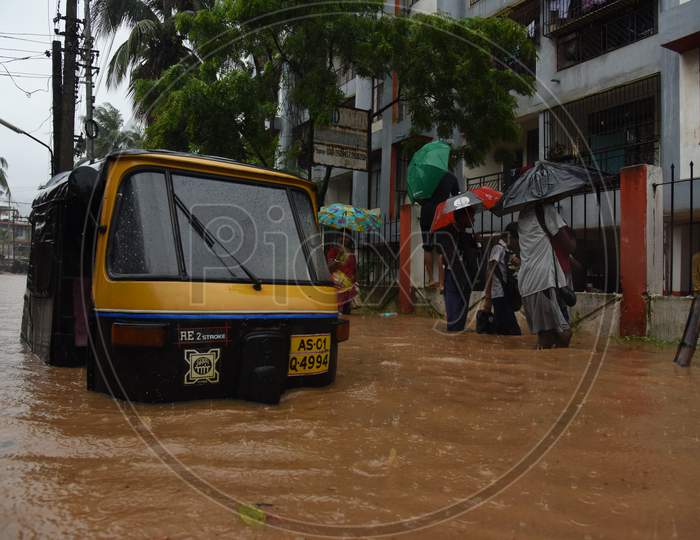 An Auto  Rickshaw On Flooded Roads Of Guwahati Due To Seasonal Floods in Guwahati City , Assam