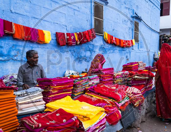 Vendor Selling Local Handloom Sarees In Jodhpur Streets