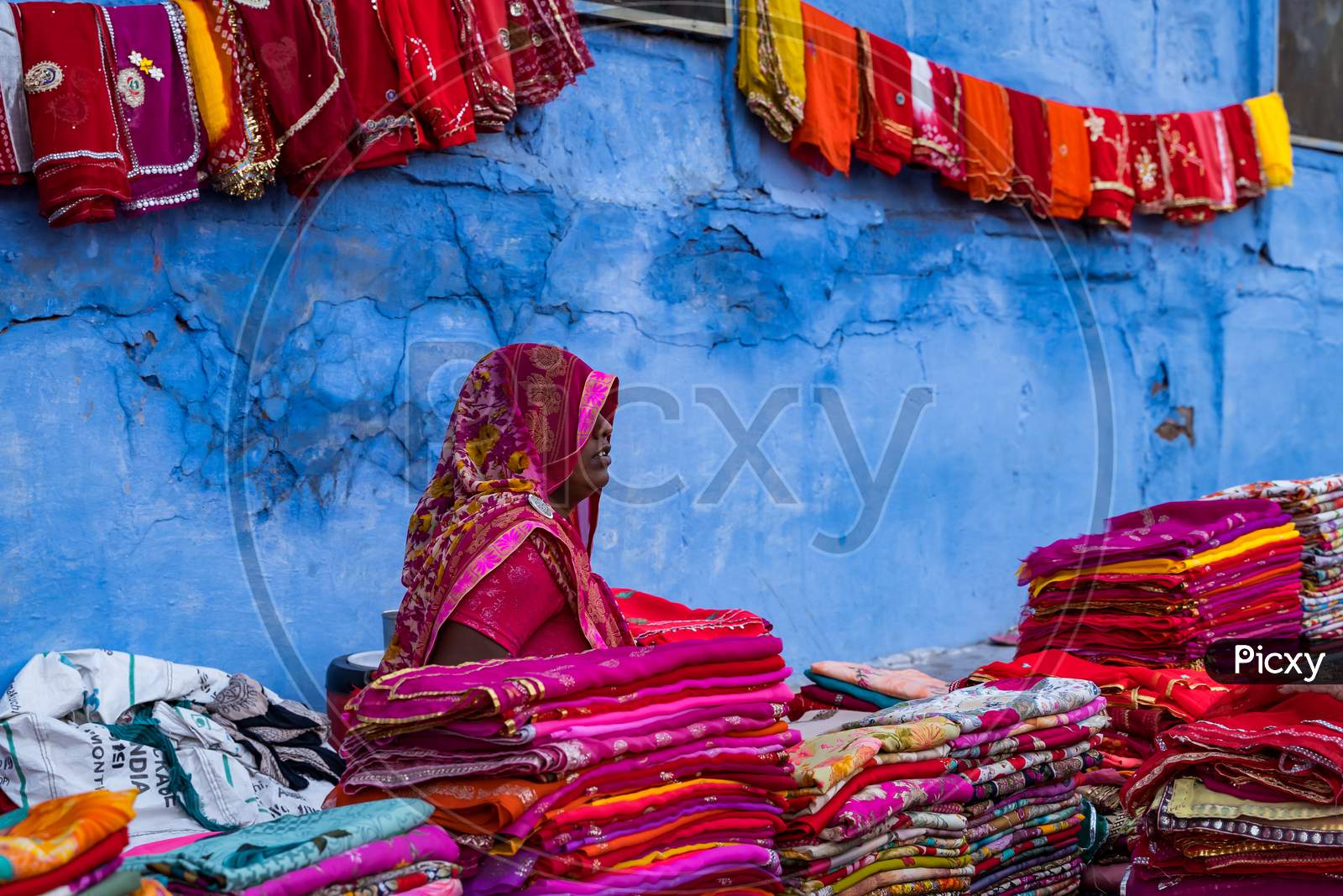 Woman Vendor Selling Local Handloom Sarees In Jodhpur Streets
