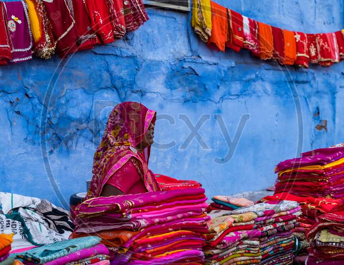 Woman Vendor Selling Local Handloom Sarees In Jodhpur Streets
