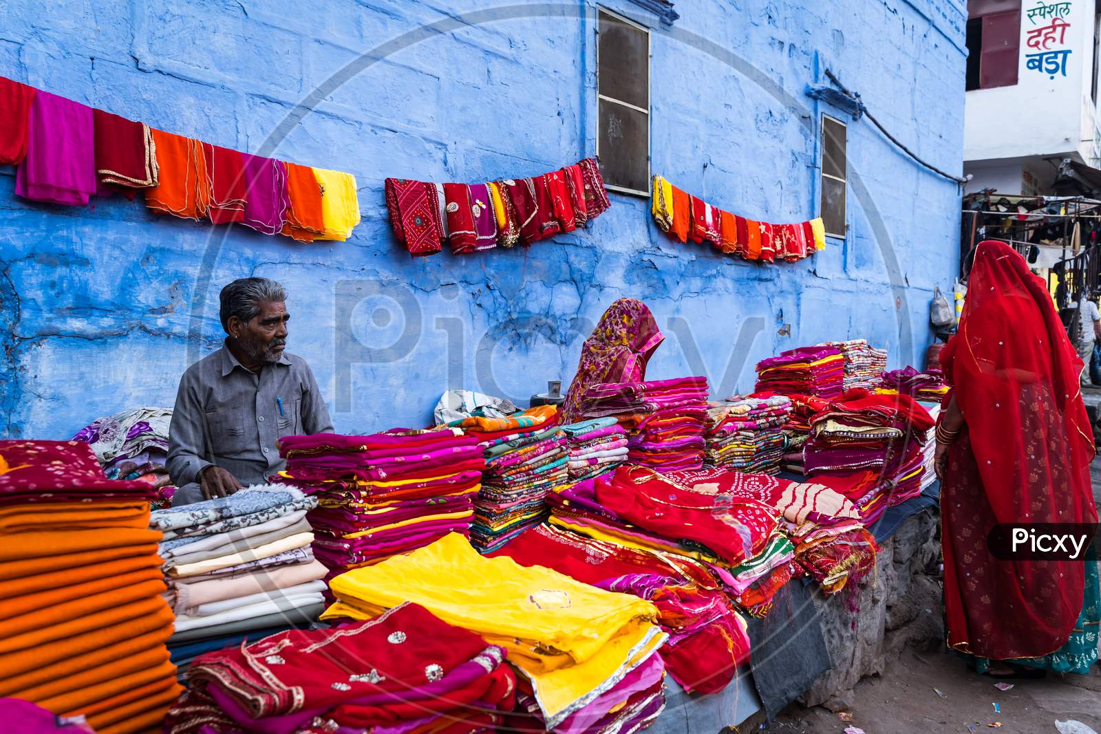Vendor Selling Local Handloom Sarees In Jodhpur Streets