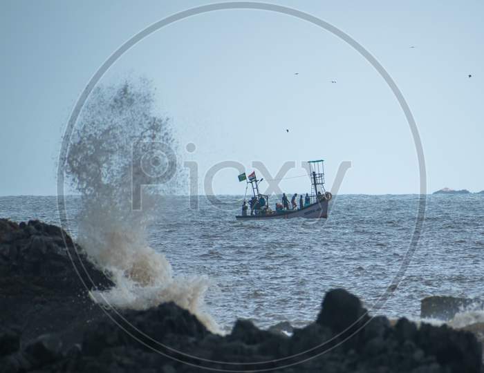 Fisherman Going For fish Hunt In a Boat Over Sea in Goa