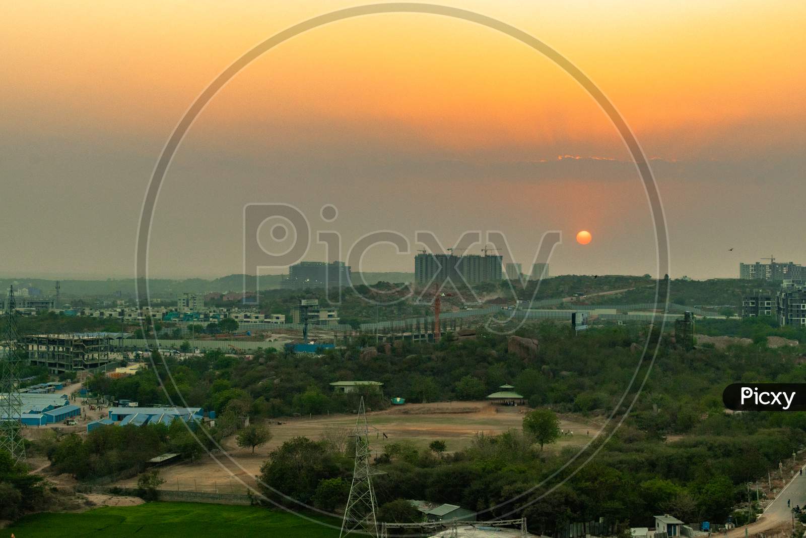 Sunset Over Hyderabad City Scape From Kajaguda Hills With High Rise Buildings