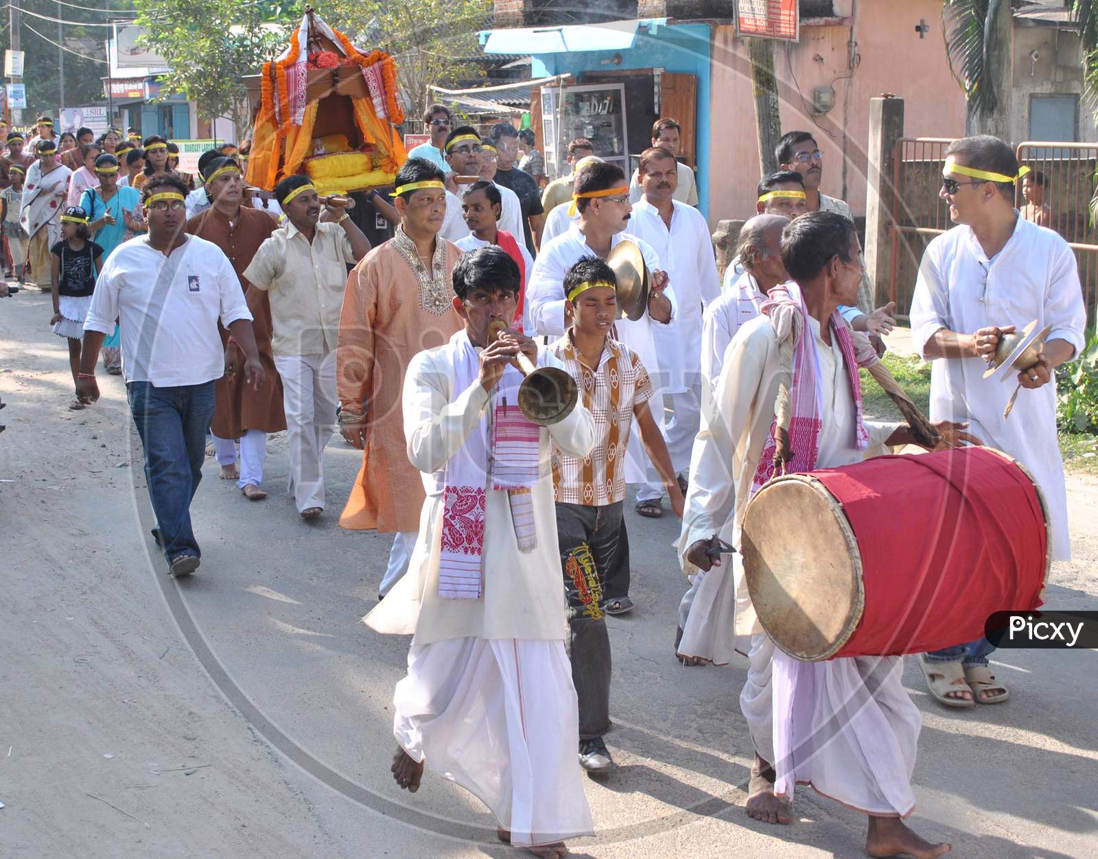 People Taking Out A Cultural Rally During The 1 Th Foundation Day Of  Sri Sri Sasibananda Sat Guru Sai Baba Sarboganin Temple  In Nagaon