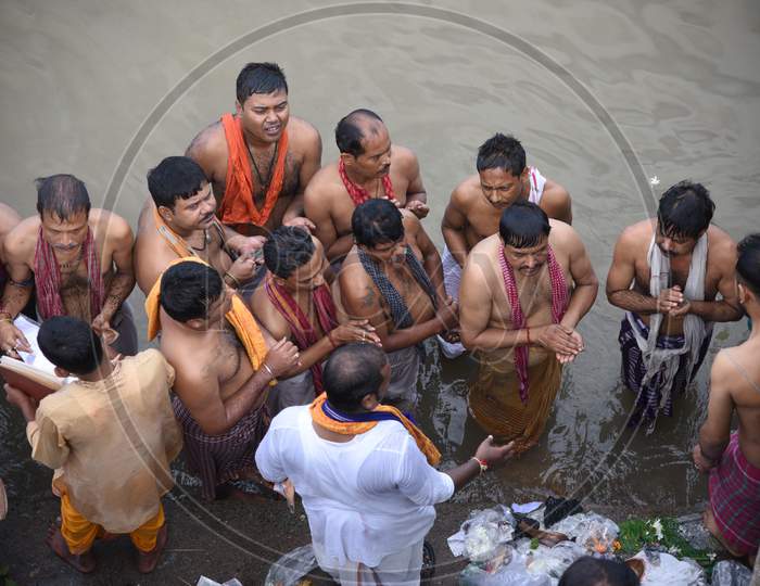 Image Of Hindu Devotees Or People Taking Bath On Holy Bramaputra River In Guwahati On Mahalaya