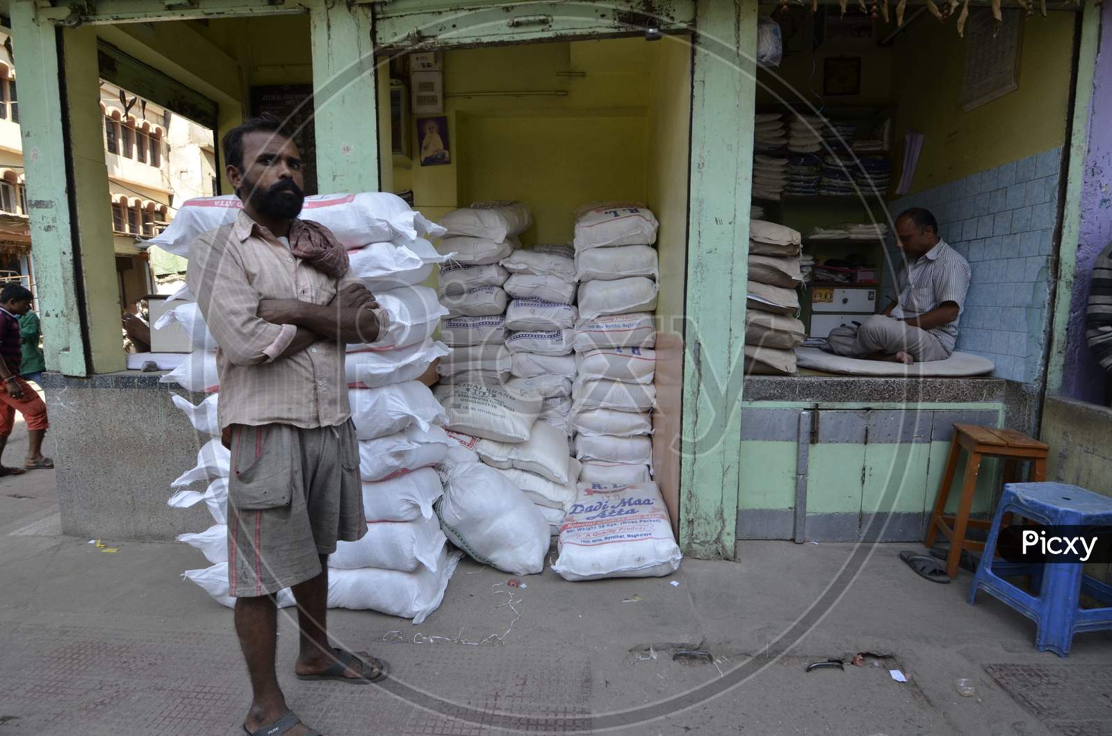 Daily Labor Workers At Goods Storage Stalls in Guwahati Fancy Bazaar, Assam