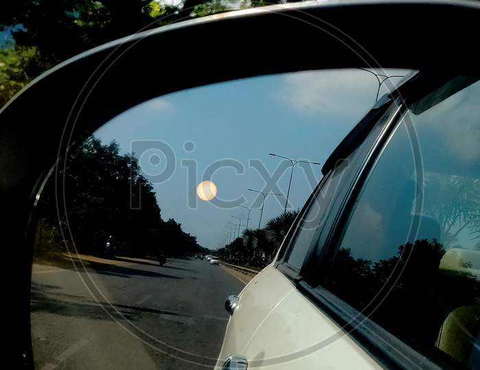 View from car mirror