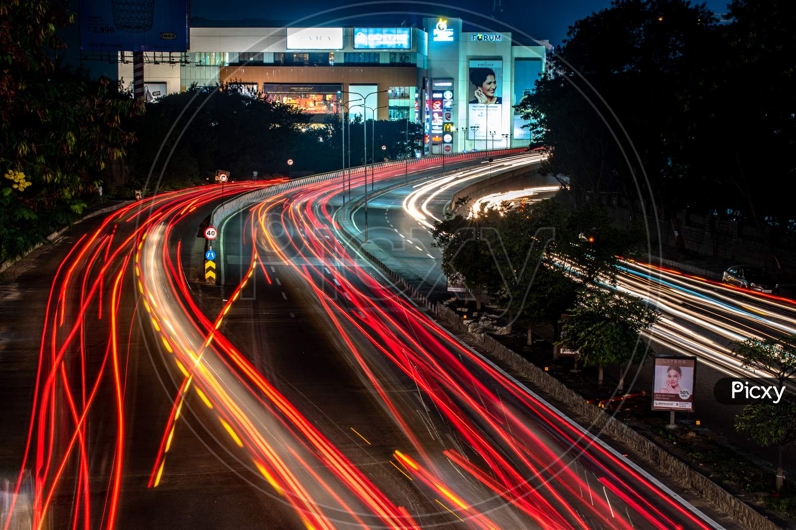 Long Exposure Of Moving Commuting  Vehicles on City Roads