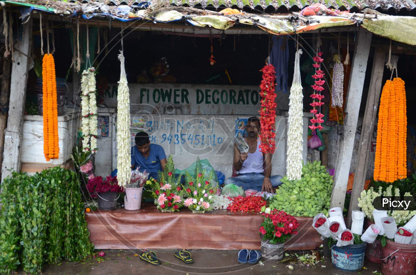 Guwahati,Assam,India -September 7th 2016 : Flower Vendors in Flower Market