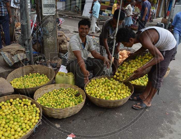Lemon Vendors in Guwahati Fancy Bazaar, Assam
