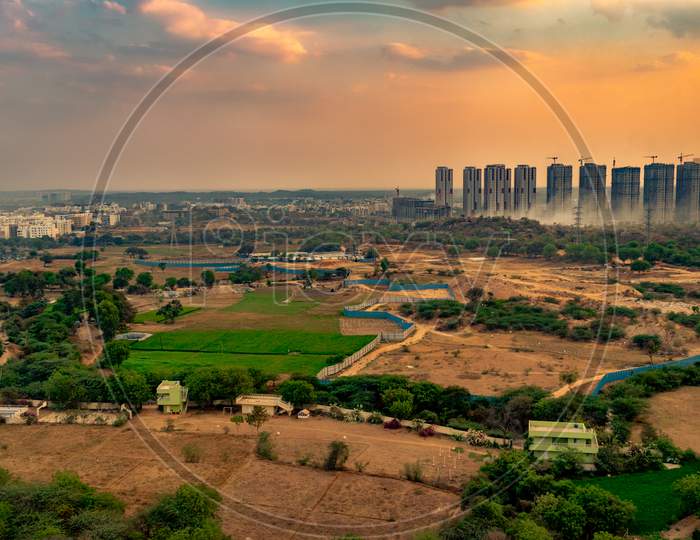 Sunset Over Hyderabad City Scape From Kajaguda Hills With High Rise Buildings