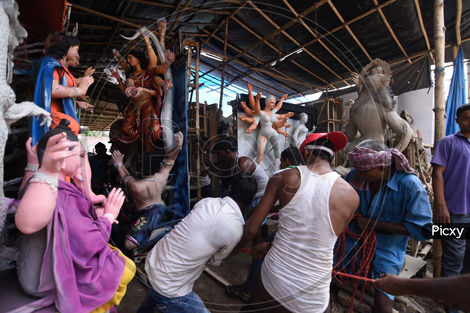 Durga Idols In Making In Workshops For Dussera Or Durga Navratri Festival Celebrations in Guwahati , Assam