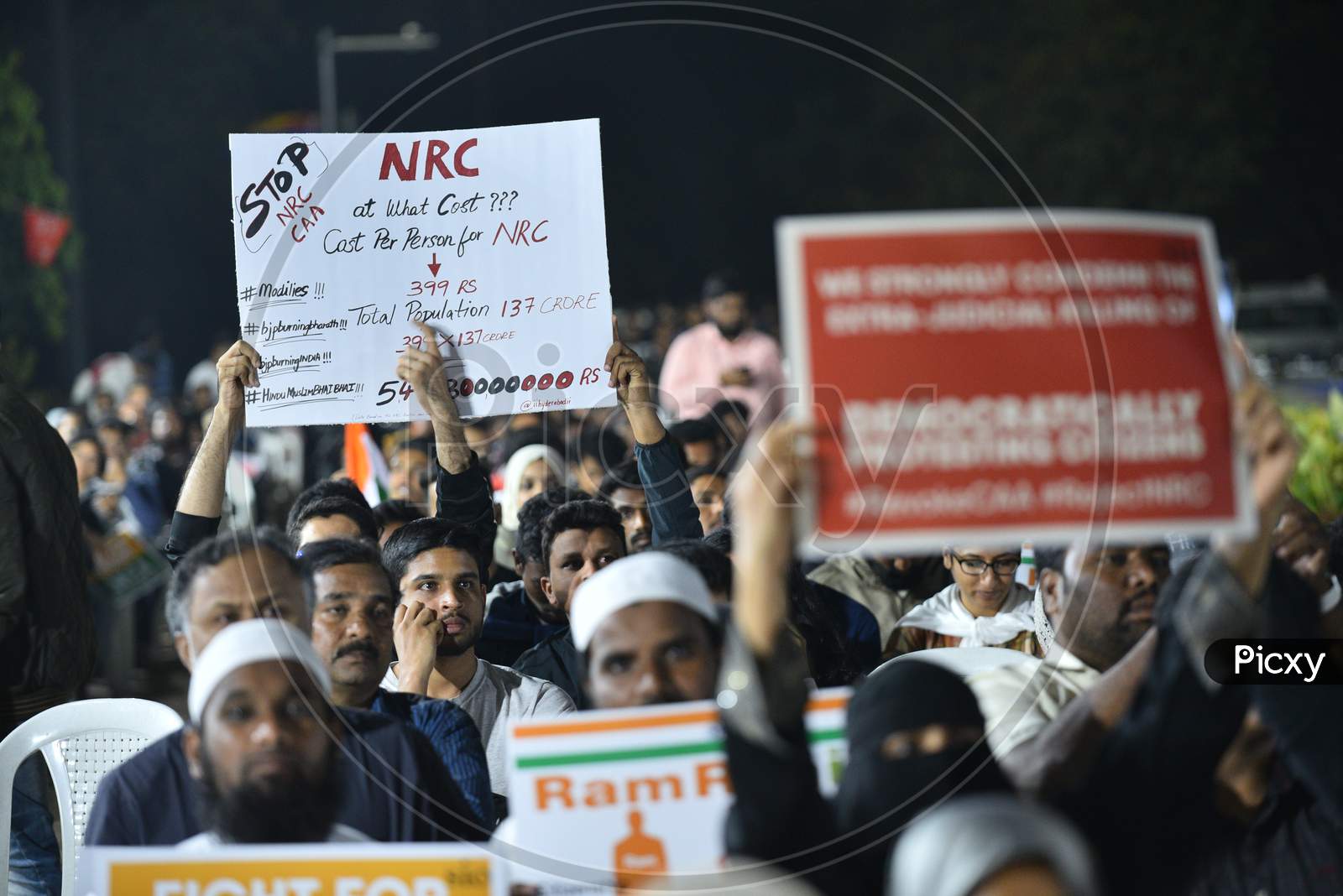 Protesters holds placards against CAA and NRC at Osmania Arts College on December 23rd,2019