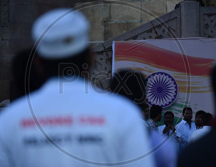 A muslim man and Indian Flag
