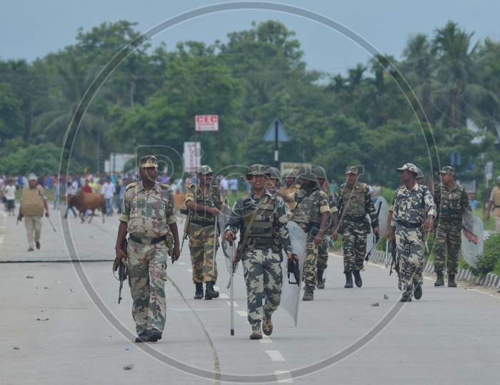 Police Personnel Try To Control The Situation During Road Block Demanding Setting Of The Aiims In Central Assam, At Raha In Nagaon District Of Assam On July 15,2016