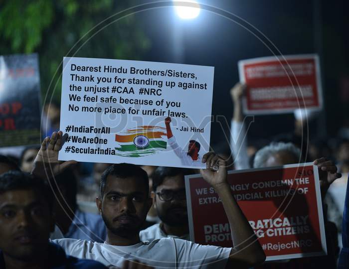 Protesters holds placards against CAA and NRC at Osmania Arts College on December 23rd,2019