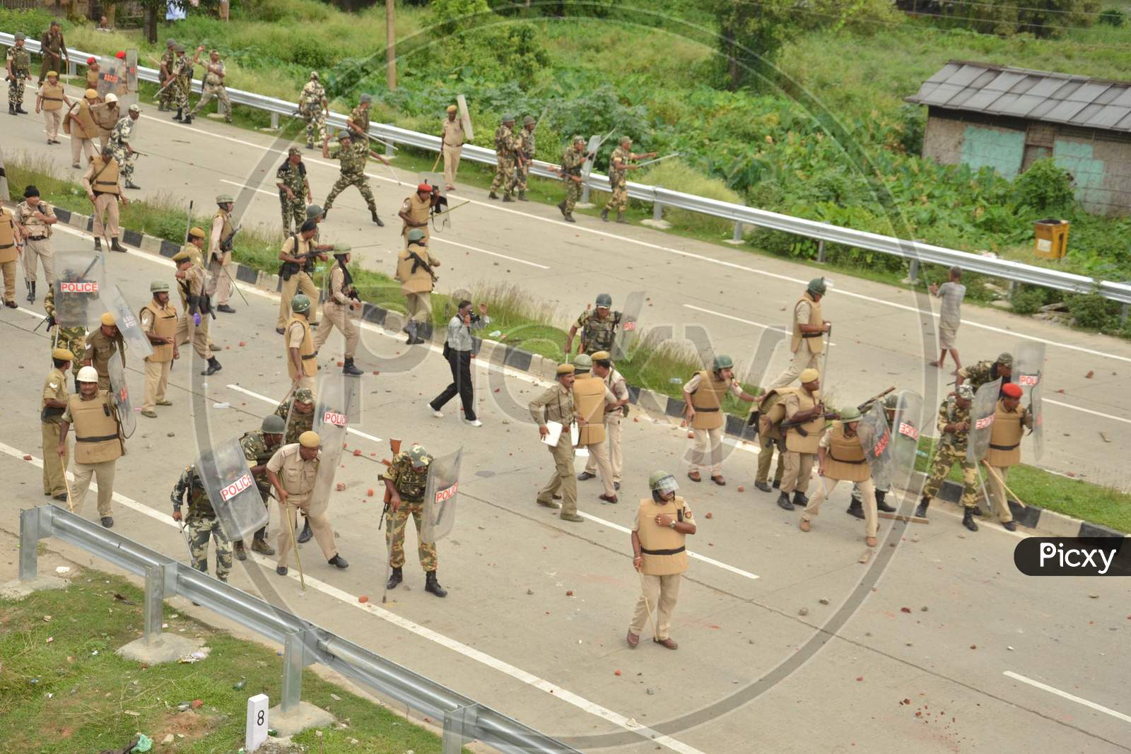 Protester Throw Stones At  Police Not In Picture During A Protest  Demanding Setting Of The Aiims In Central Assam, At Raha In Nagaon District Of Assam On July 15,2016.