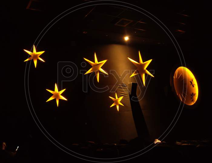 Interior Of an Theater With Stars And Globe  Neon Light Decoration