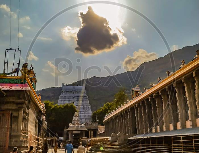Hindu Temple Shrine With Dark Clouds Background