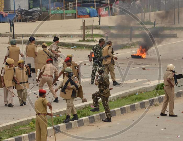 Police Personnel Try To Control The Situation During Road Dlock Demanding Setting Of The Aiims In Central Assam, At Raha In Nagaon District Of Assam On July 15,2016