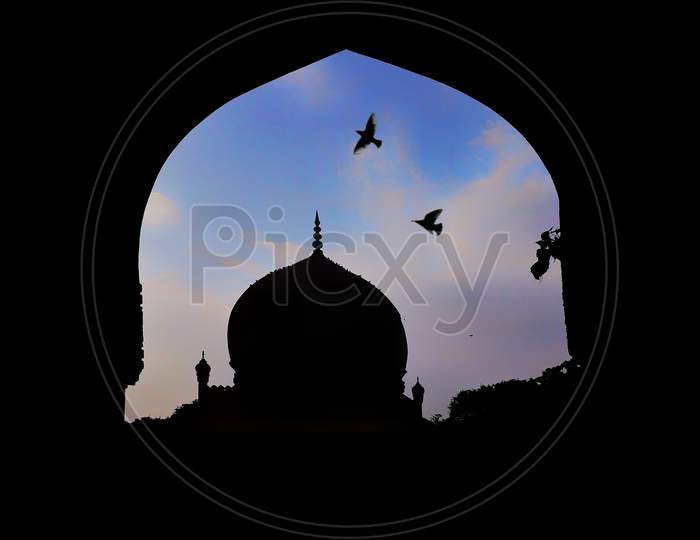 Silhouette of Qutub Shahi Tomb Minar