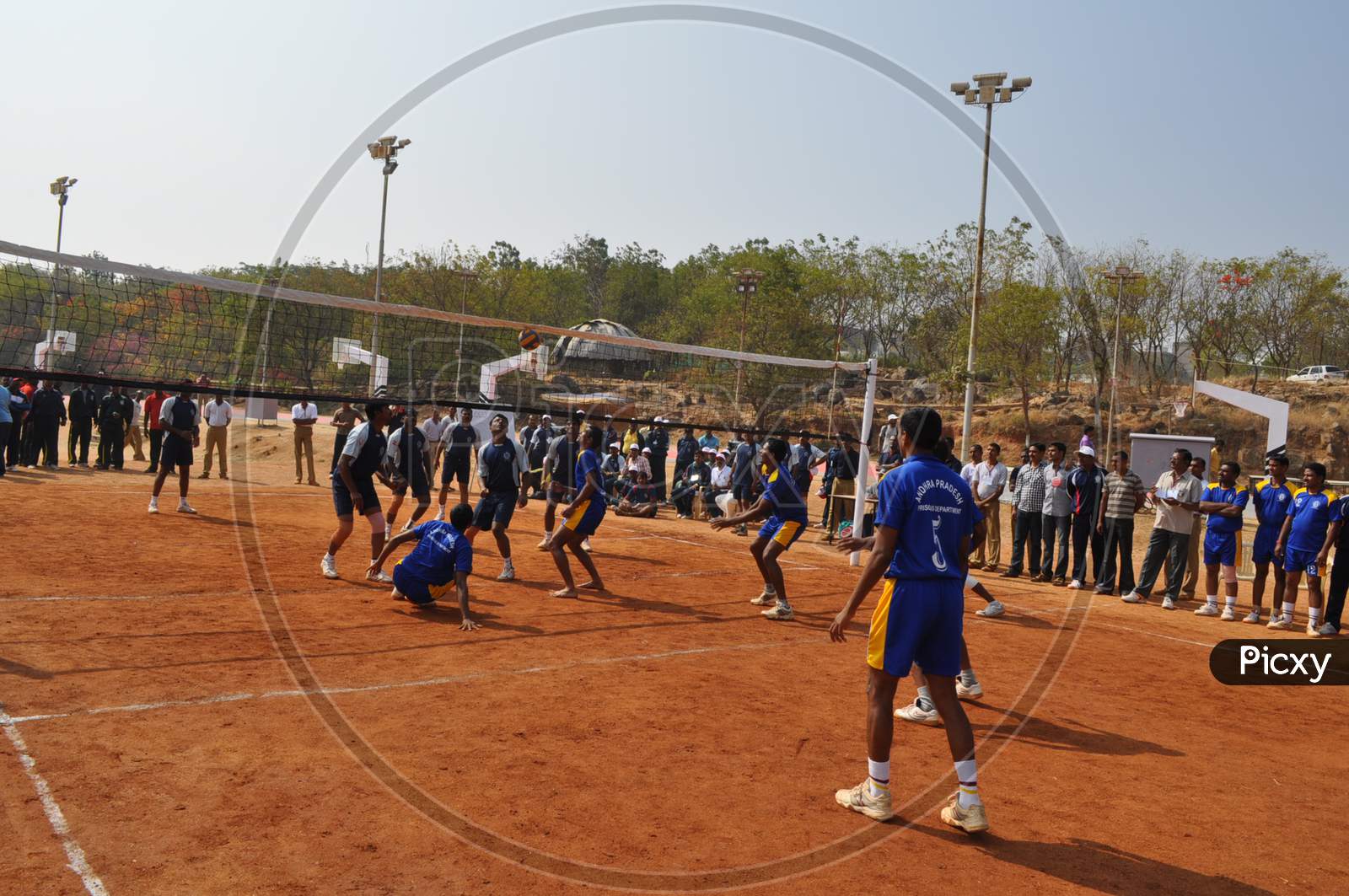 Two School teams playing volleyball match