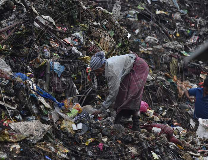 Indian Rag Pickers in  Dumping Ground Or Yard in Guwahati