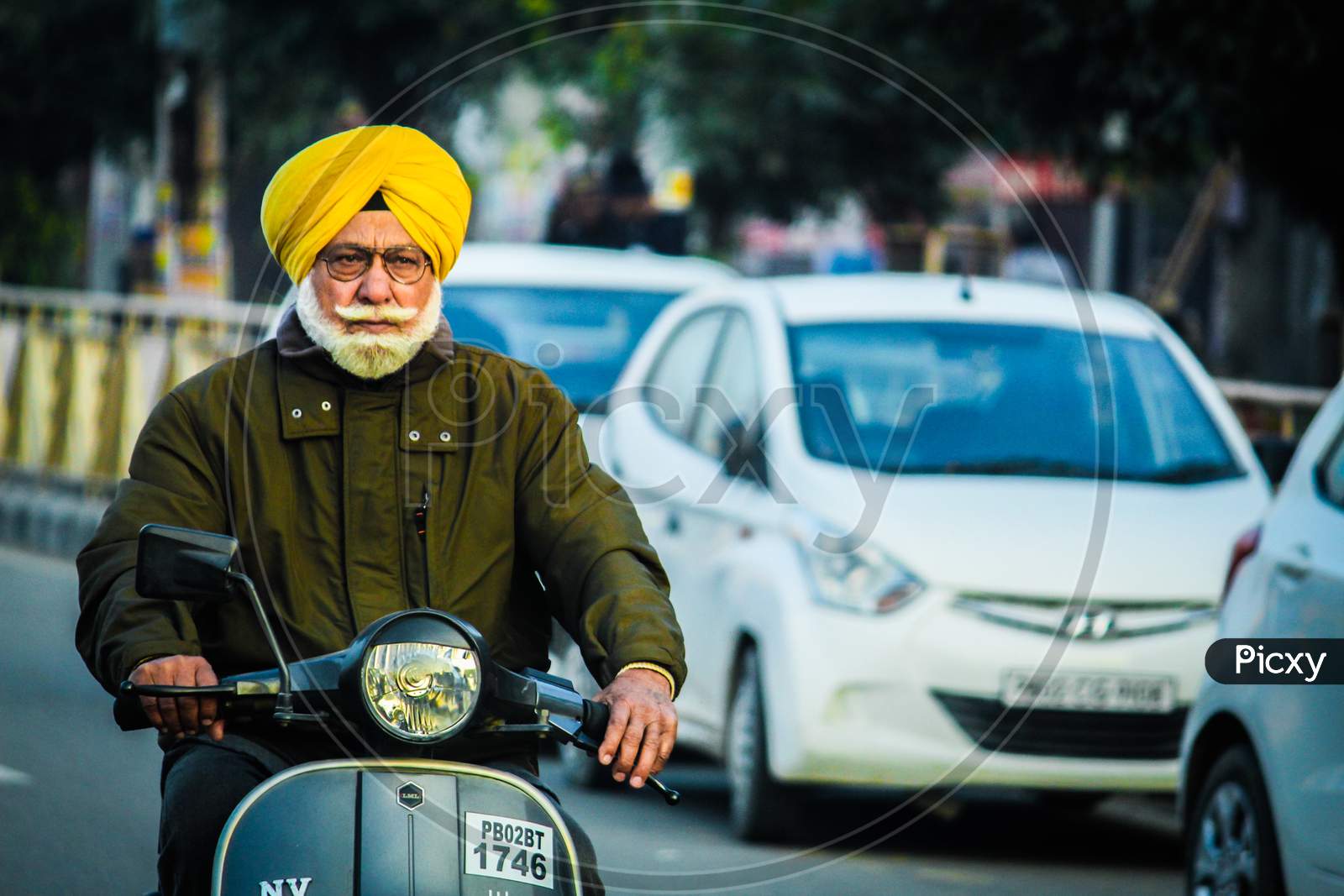 Old man riding Bike at Amritsar