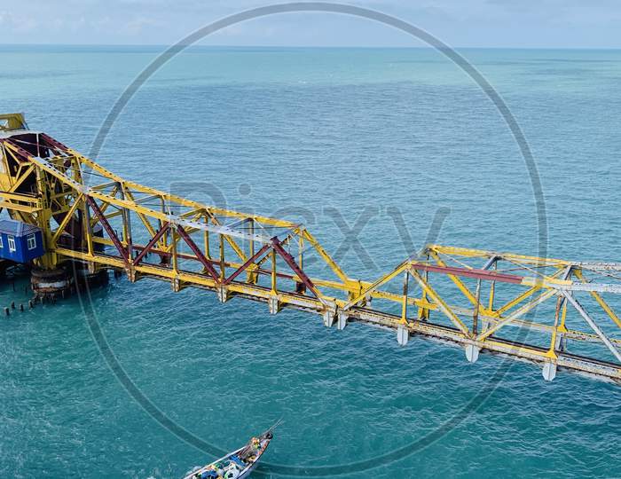 Pamban Bridge  Over Sea With Train And Boat On Sea Composition