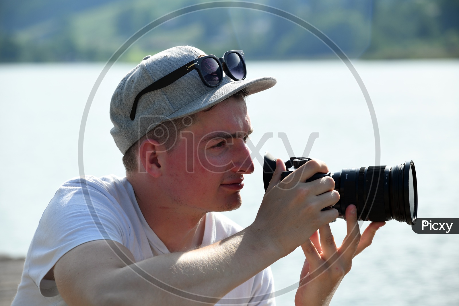A Photographer With DSLR Camera