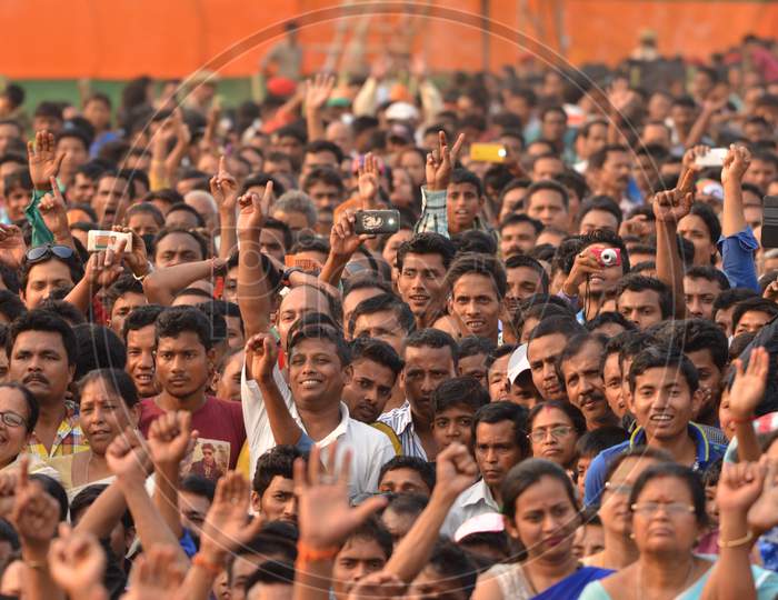 Crowd of Young Indian Cheering and Recording With Smartphones At Prime Minister Narendra Modi Political Meeting In Assam