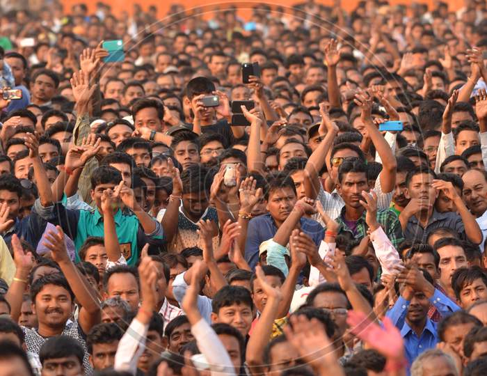 Image of Crowd of Young Indian Cheering and Recording With Smartphones